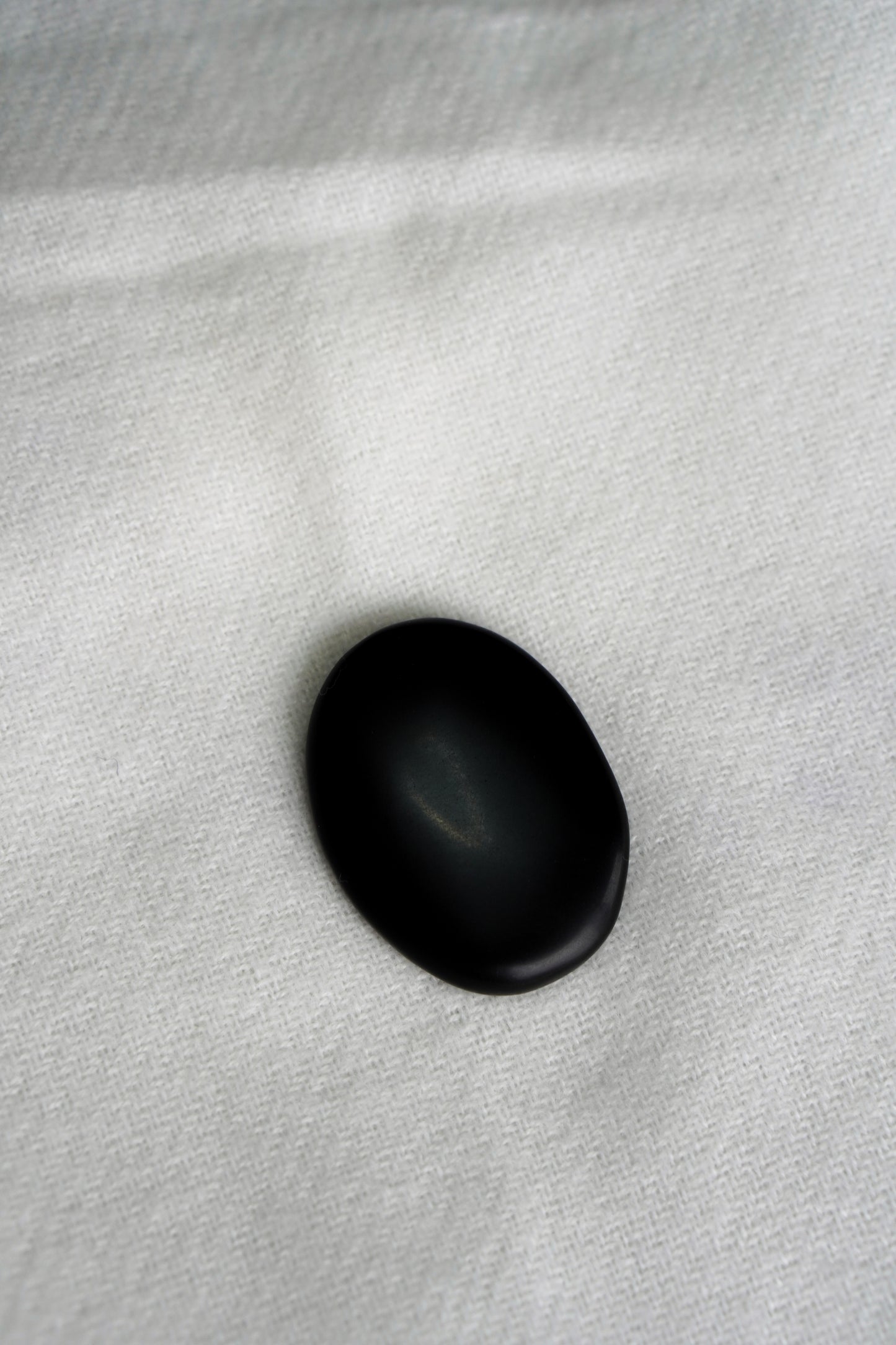 Agate black pocket stone